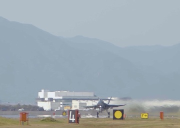 F/A-18 Hornets Fly With Harpoon Missiles