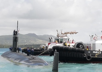 USS Alexandria departs Guam