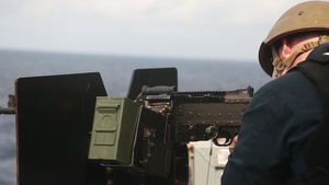 Blue-Green machine gun team: 31st MEU Marines train with Sailors on M240B (B-Roll)