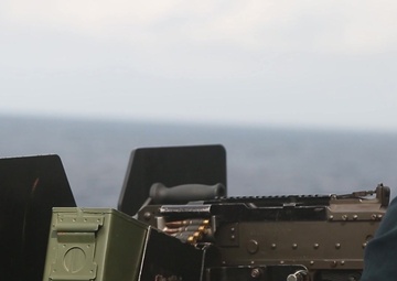Blue-Green machine gun team: 31st MEU Marines train with Sailors on M240B (B-Roll)