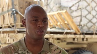 Tank Mechanic Qualifies on Weapons in Desert