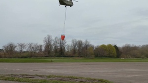 NY Army National Guard helicopter crews conduct water bucket training over Lake Ontario