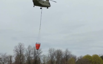 NY Army National Guard helicopter crews conduct water bucket training over Lake Ontario