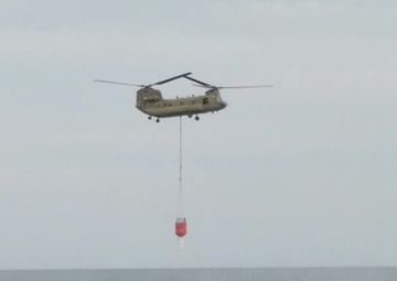NY Army National Guard helicopter crews conduct water bucket training over Lake Ontario