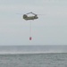 NY Army National Guard helicopter crews conduct water bucket training over Lake Ontario