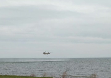 NY Army National Guard helicopter crews conduct water bucket training over Lake Ontario