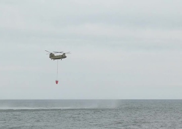 NY Army National Guard helicopter crews conduct water bucket training over Lake Ontario