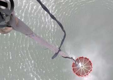 NY Army National Guard helicopter crews conduct water bucket training over Lake Ontario
