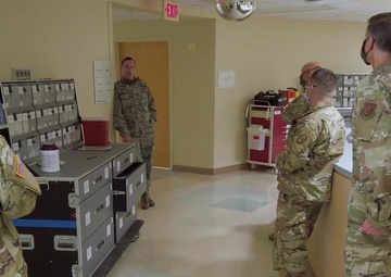 Joint medical team standing up medical support shelter