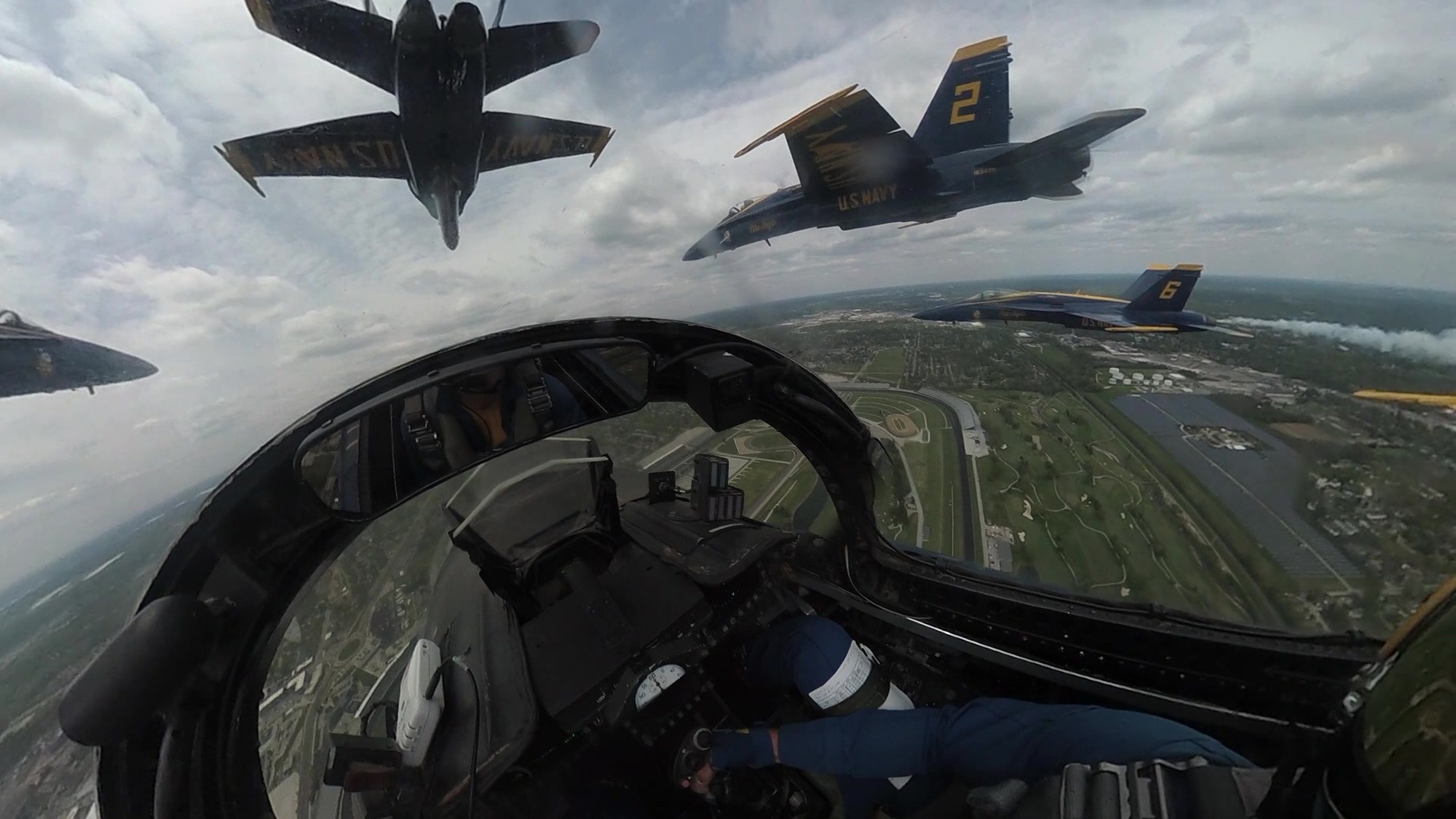 200512-N-YO638-1004 INDIANAPOLIS (May 12, 2020) The U.S. Navy Flight Demonstration Squadron, the Blue Angels honored frontline COVID-19 first responders and essential workers with formation flights over Detroit, Chicago, and Indianapolis on May 12, 2020. Cockpit footage from Lt. Cmdr. James Cox, Slot Pilot. (U.S. Navy video by Mass Communication Specialist 2nd Class Cody Hendrix)