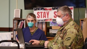 Soldiers and Airmen from the Massachusetts National Guard provide care to patients with COVID-19. (B-Roll)