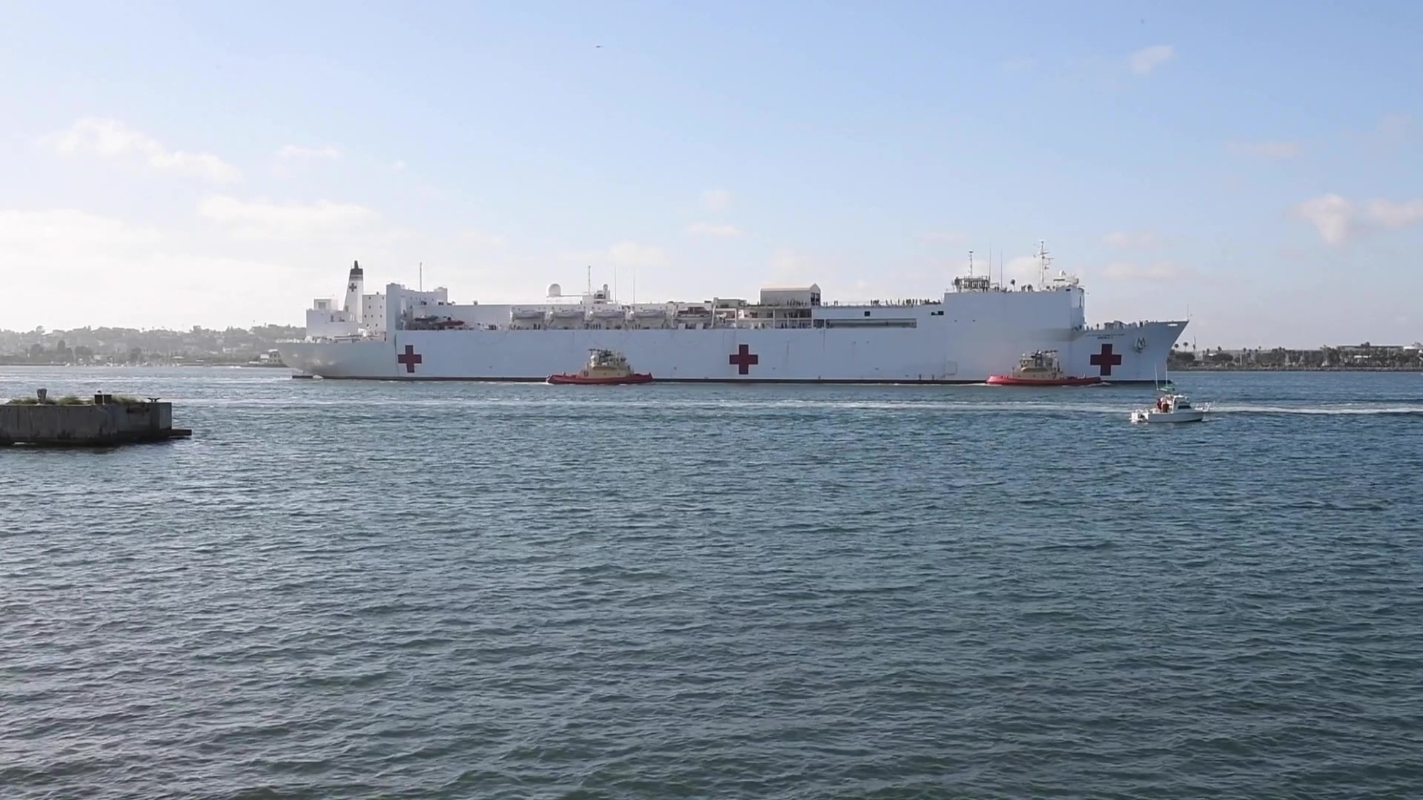 SAN DIEGO (May 15, 2020) A video b-roll package of the hospital ship USNS Mercy (T-AH 19) arriving in San Diego. Mercy deployed to Los Angeles in support of the nation&#39;s COVID-19 response efforts, and served as a referral hospital for non-COVID-19 patients admitted to shore-based hospitals. This allowed shore-based hospitals to focus their efforts on COVID-19 cases. One of the Department of Defense&#39;s missions is Defense Support of Civil Authorities. DOD is supporting the Federal Emergency Management Agency, the lead federal agency, as well as state, local and public health authorities in helping protect the health and safety of the American people.