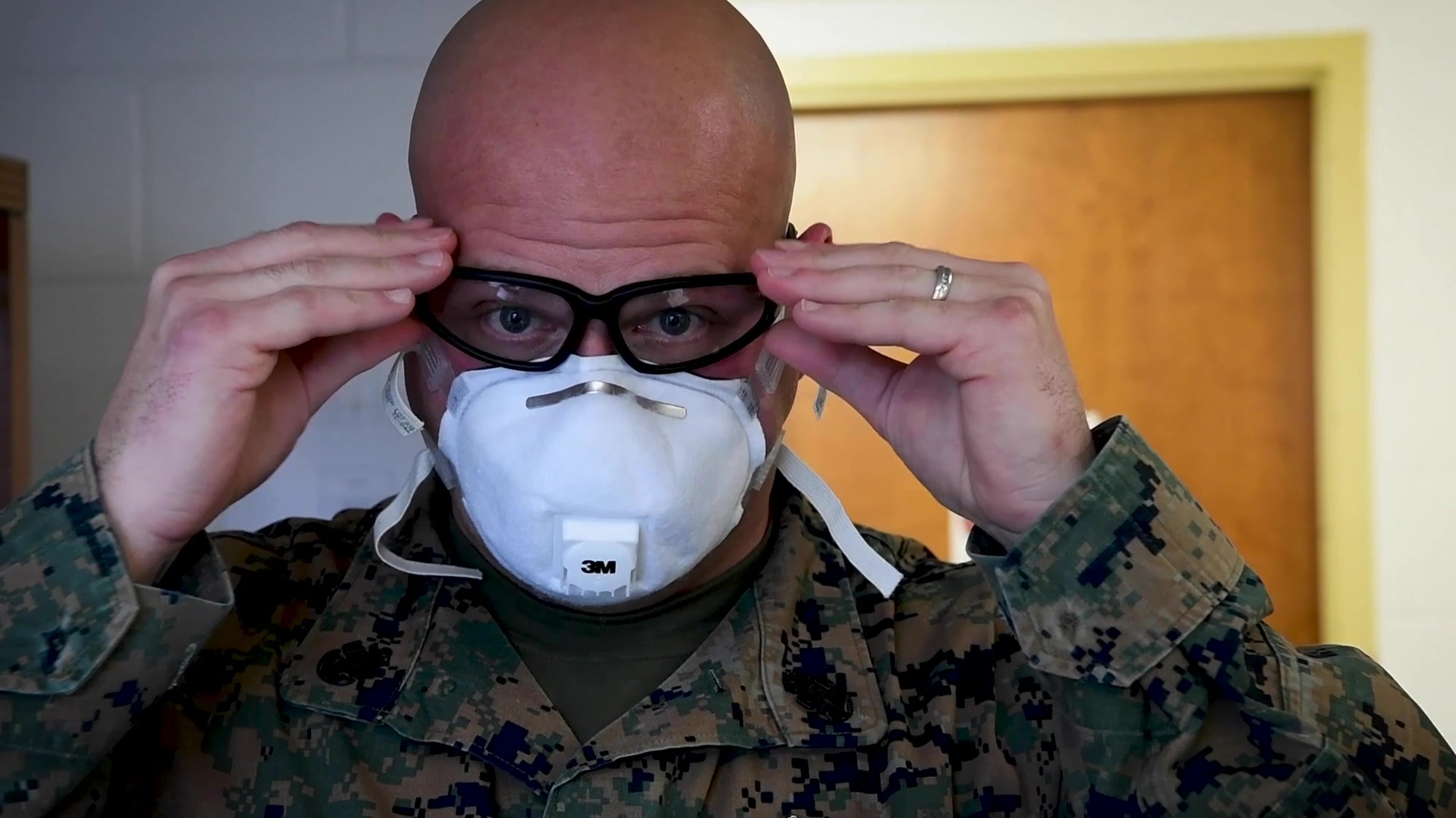Chief Petty Officer Roger George, 2nd Marine Expeditionary Brigade, Task Force Northeast, healthcare service support chief, conducts daily randomized temperature checks for U.S. Army soldiers and Marines April 22, 2020, at Ft. Devens, Mass. The temperature checks are to ensure the force is healthy while they support Joint Task Force Northeast’s mission of assisting the American public responding to COVID-19 by providing low-acuity medical care in urban areas to support the Joint Task Force Land Component Commander (JFLCC), at the request of FEMA. (U.S. Air Force video by Staff Sgt. Zoe Russell)