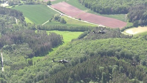 An entire Apache battalion conducts flight training over Bavaria
