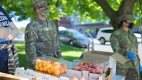 Guardsmen of The 1-103rd Field Artillery Distribute Milk and Produce to Rhode Islanders