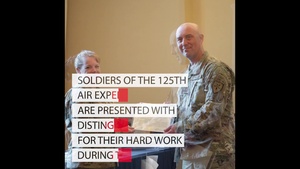 125 Air Expeditionary Squadron Commander Lt. Col. Deborah Garrett Presents Service Medals To Soldiers of the 125th AES