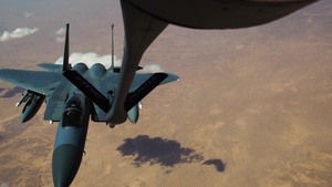 A U.S. Air Force KC-135 aircrew assigned to the 28th Expeditionary Air Refueling Squadron conducts an aerial refueling mission