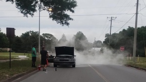 Car Fire: Hurlburt Airman helps Eglin AFB Airman during emergency