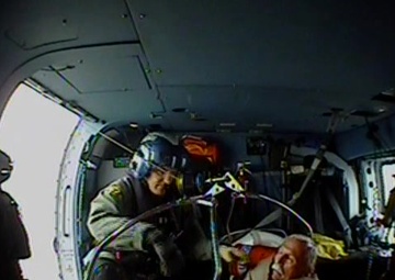 Coast Guard rescues 2 people, 1 cat from sinking houseboat