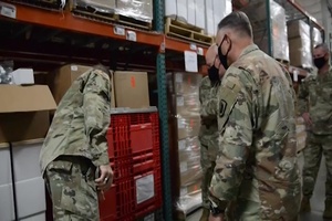 Bret D. Daugherty, Adjutant General, Washington State visits COVID-19 test kit assembly site