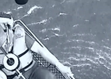 Coast Guard members rescue 2 people, 1 cat from sinking houseboat