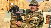 Joint Efforts Lead to Life-Saving Transport and Treatment of Military Working Dog