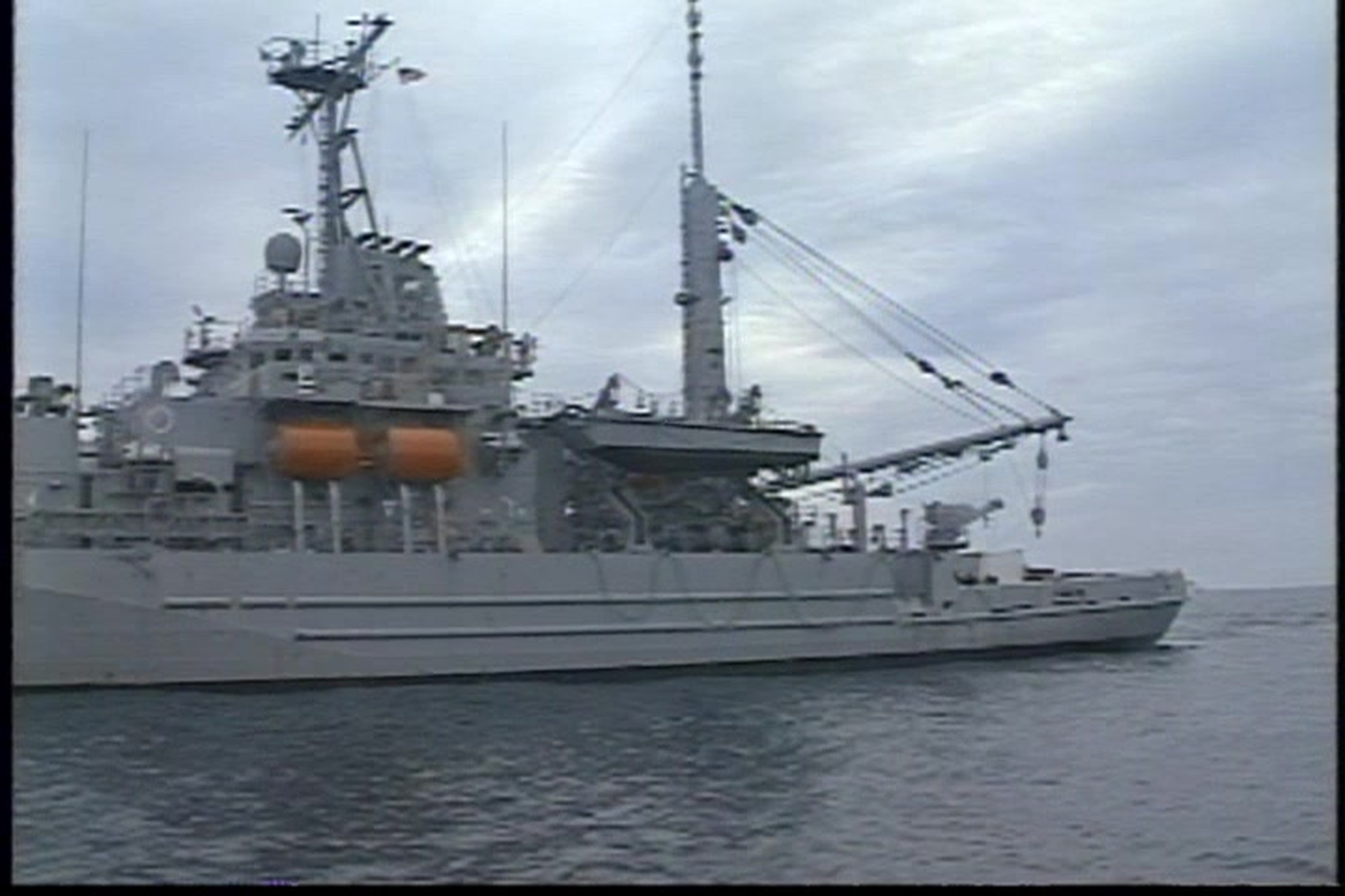 The rescue and salvage ship USS Grasp (ARS 51) and the rescue and salvage ship USS Grapple (ARS 53) conduct operations in response to the crashed Trans World Airlines (TWA) Flight 800 aircraft off the coast of Moriches, New York, July 29, 1996. TWA Flight 800 was a Boeing 747-100 aircraft that exploded and crashed into the Atlantic Ocean on July 17, 1996, after takeoff from John F. Kennedy International Airport on a scheduled international passenger flight to Rome, resulting in the death of all 230 individuals on board. (U.S. Navy video)