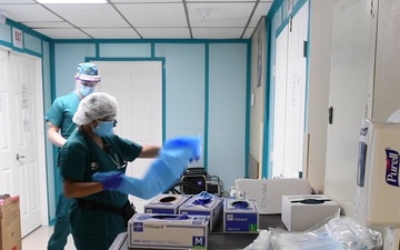 (B-roll) Sailors provide care at Valley Baptist Medical Center in Harlingen, Texas.