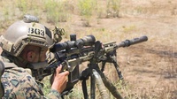 Marines engage targets during Scout Sniper Course