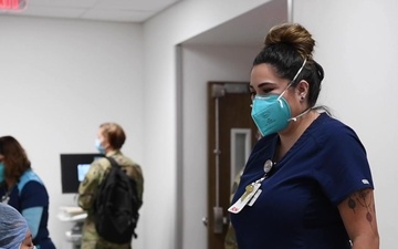 Soldiers assigned to an Urban Augmentation Medical Task Force conduct orientation training at hospital in Corpus Christi