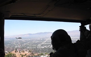 Twelve Black Hawks fly over Los Angeles