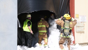 Edwards AFB firefighters conduct search and rescue training during foam test
