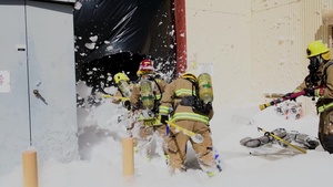 Edwards AFB firefighters conduct search and rescue training during foam test