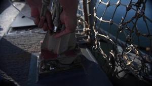 Morning Colors Aboard USS Sampson