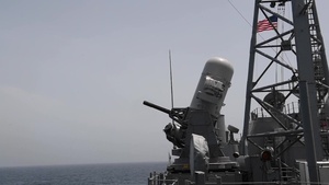 Close-in weapon system pre-aimed calibration fire aboard USS Princeton