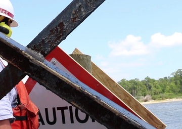 Norfolk District navigation support installs SAV oyster reef signage