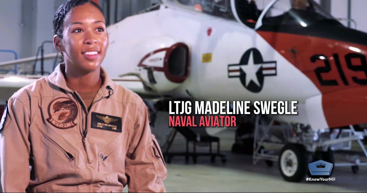 Swegle becomes Navy's first Black female tactical jet pilot; Reid