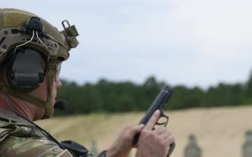 Airmen firing downrange