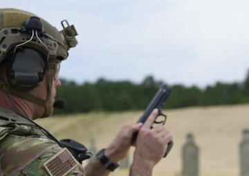 Airmen firing downrange