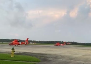 Coast Guard aircrew launch for post-storm flight assessments