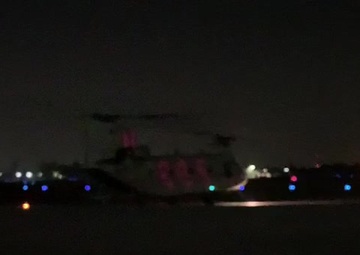 California National Guard CH-47 Chinook helicopter landing with evacuees from Creek Fire
