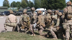 U.S, Ukrainian, and Polish Special Forces conduct fast rappelling