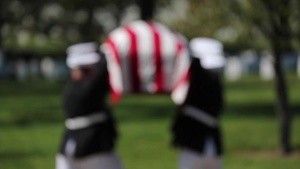Marine Corps Body Bearers lay repatriated WWII Marine Pfc. Harry Morrissey to rest at Arlington National Cemetery