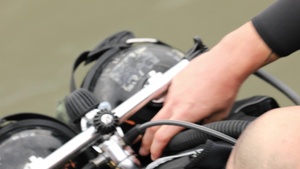 Army divers survey harbor of Port Arthur