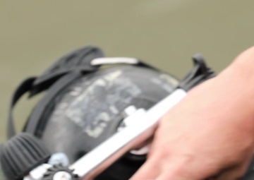 Army divers survey harbor of Port Arthur