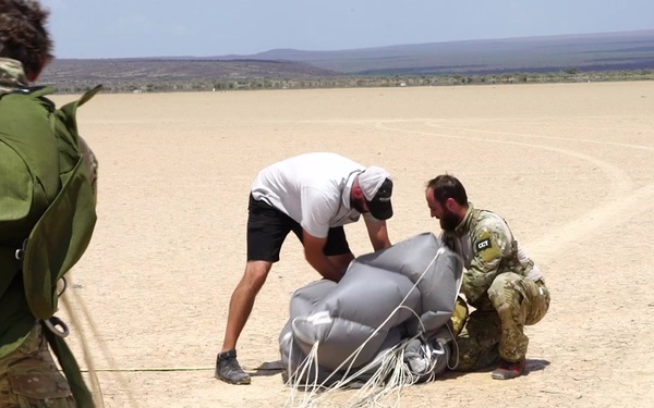 82nd ERQS Pararescuemen execute cargo drop and Tandem Jump from C-130J Super Hercules