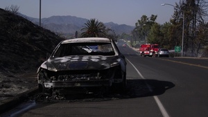 B-Roll: Firefighters battle fire near Camp Pendleton housing