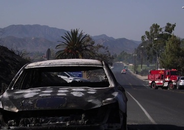 B-Roll: Firefighters battle fire near Camp Pendleton housing