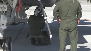 U.S. Marine Corps Maj. Mark Dion Prepares to Fly