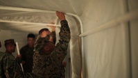 U.S. Marines with HQBN 3d Marine Division set up a MECC